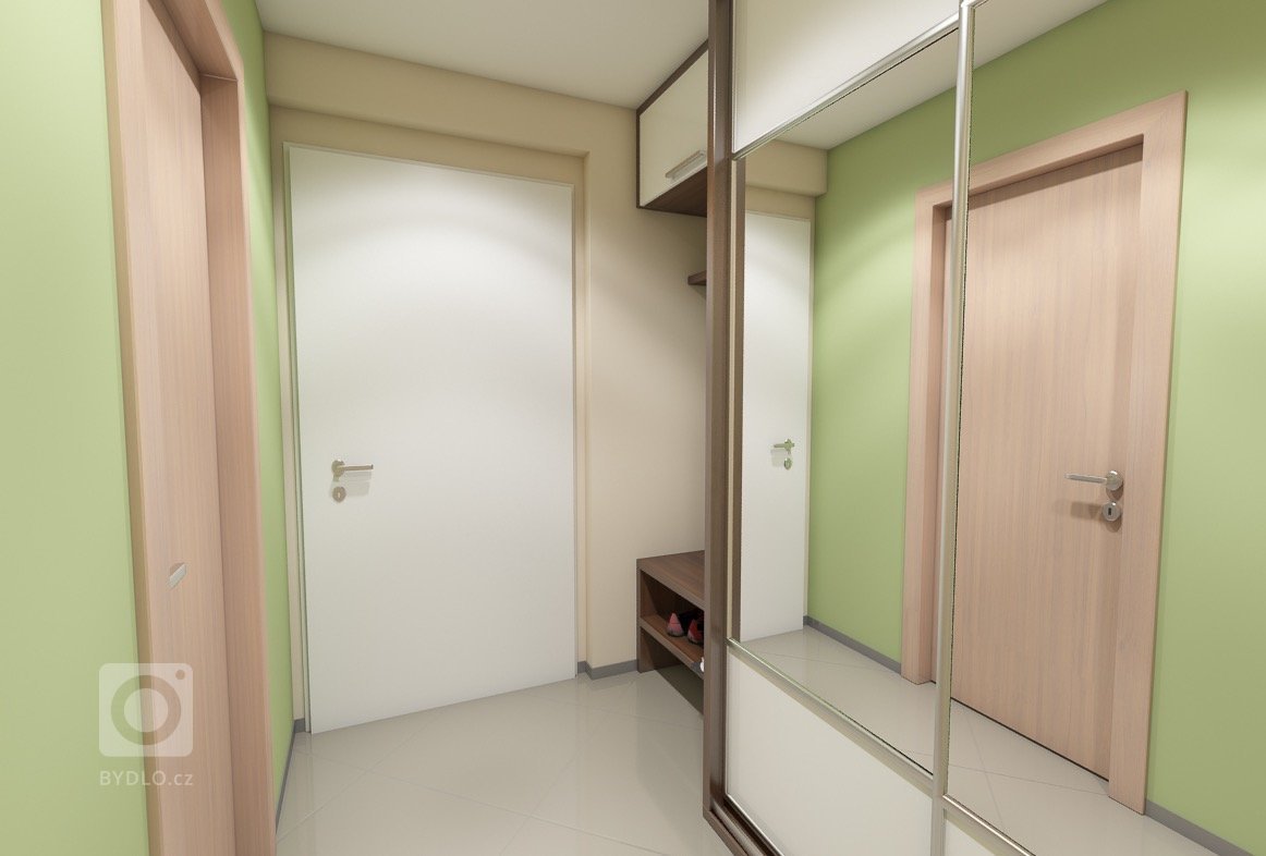 Vstupní předsíň v dekoru tmavého dřeva a bílého lesku. S otevřeným botníkem, věšákovou stěnou a vestavěnou skříní.&nbsp;
