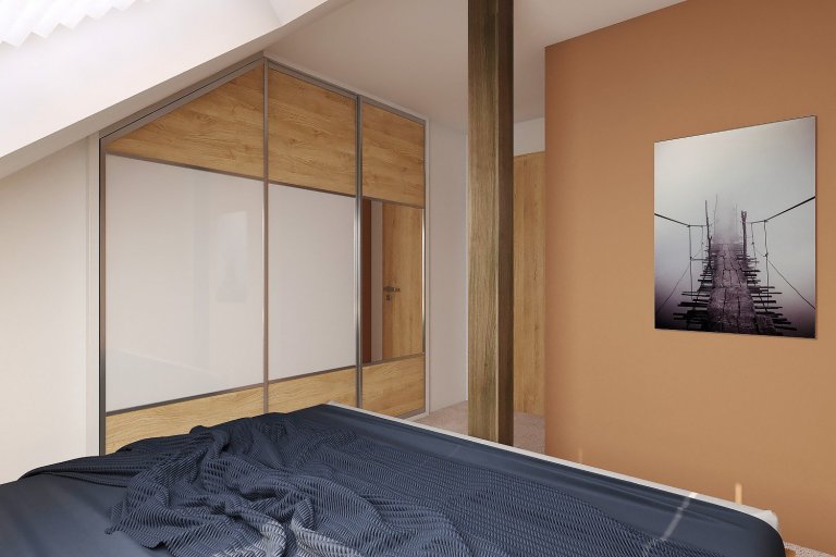 Šatní skříň je vyrobena na zakázku z materiálu lamino (LTD) v dekoru dřeva světlý buk a bílý lesk. Skříň obsahuje posuvné dveře s jedním zrcadlem umístěným na vnějším křídle. Některým nerozhodným tak odpadne neustále běhání mezi skříní a zrcadlem v koupelně či na chodbě. Vnitřní prostor má prakticky řešené vnitřní členění, jako jsou přihrádky, poličky a šatní tyče. Šatní tyč a pojezdy jsou z kovu.