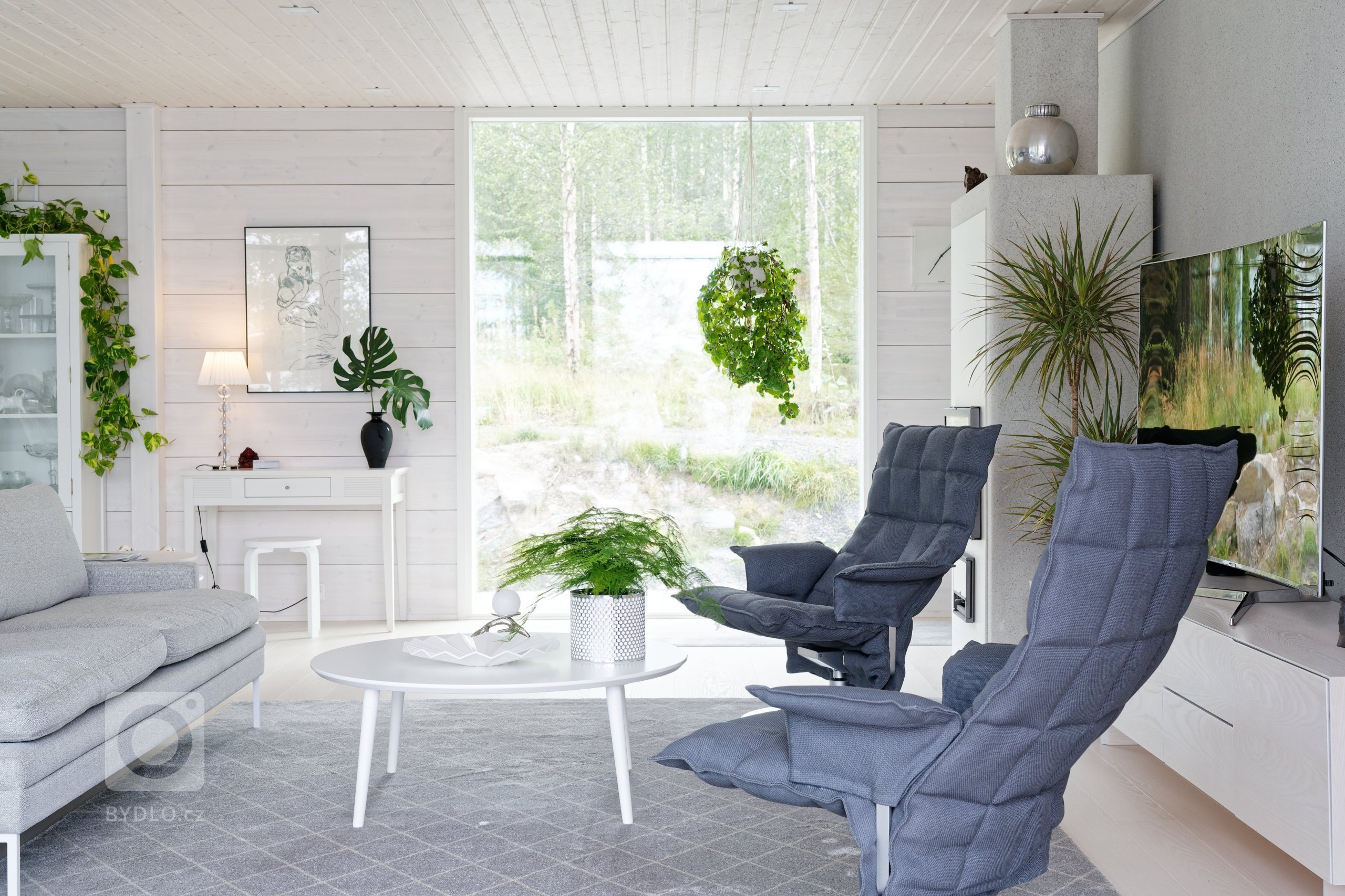 KONTIO Glasshouse je dřevěný dům z lepených hranolů SmartLog o rozměrech 205x275 (inovativní technologie SmartLog zamezuje sedání dřeva). Tento Glasshouse s…