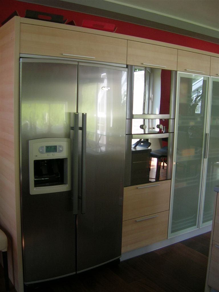 kuchyňská linka propojená s obyvacím prostorem
