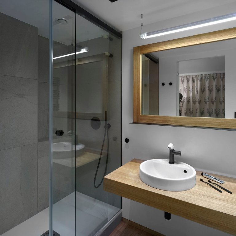 Interiér soukromého horského&nbsp;apartmánu v Beskydech
