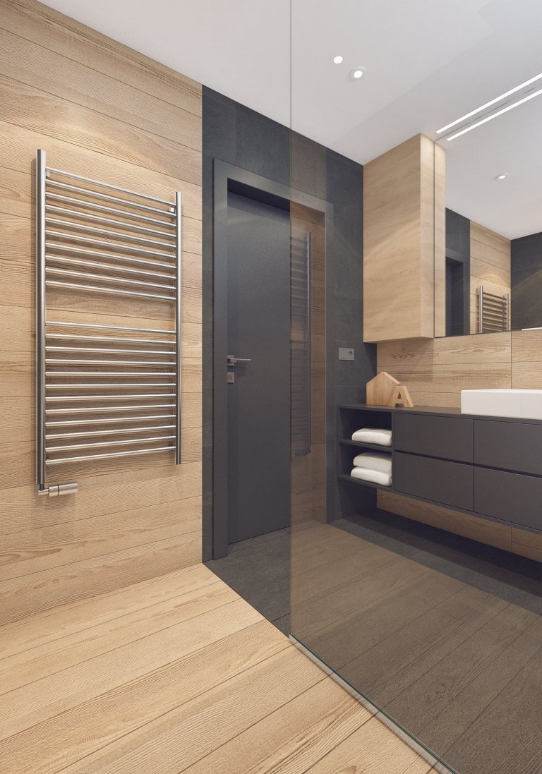 Návrh interiéru bytu pro mladého muže. V interiéru převládá kombinace antracitové barvy s bílou, světlým dřevodekorem a šedou. Doplňkou barvou je tmavě modrá,…