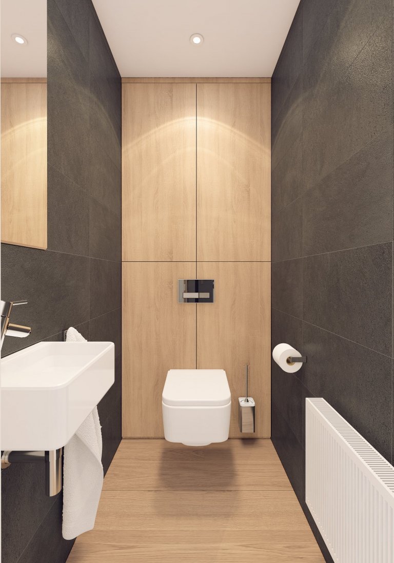 Návrh interiéru bytu pro mladého muže. V interiéru převládá kombinace antracitové barvy s bílou, světlým dřevodekorem a šedou. Doplňkou barvou je tmavě modrá,…